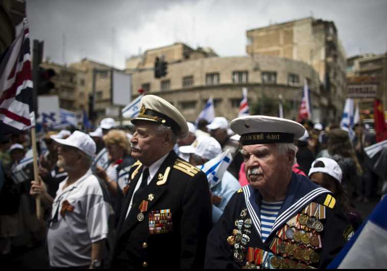 Veterans march through Jerusalem to mark WW2 Victory in Europe Day.