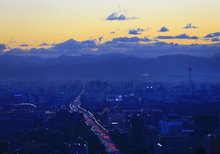 A view of the city's skyline from the Beijing Yintai Centre building at sunset in Beijing