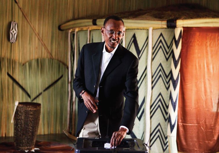 RWANDAN PRESIDENT Paul Kagame casts his ballot during the presidential election in Kigali in 2010
