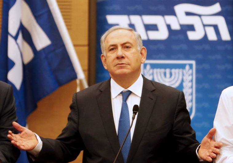  Prime Minister Benjamin Netanyahu (C) attends a meeting of the Likud party in the Israeli parliament in Jerusalem