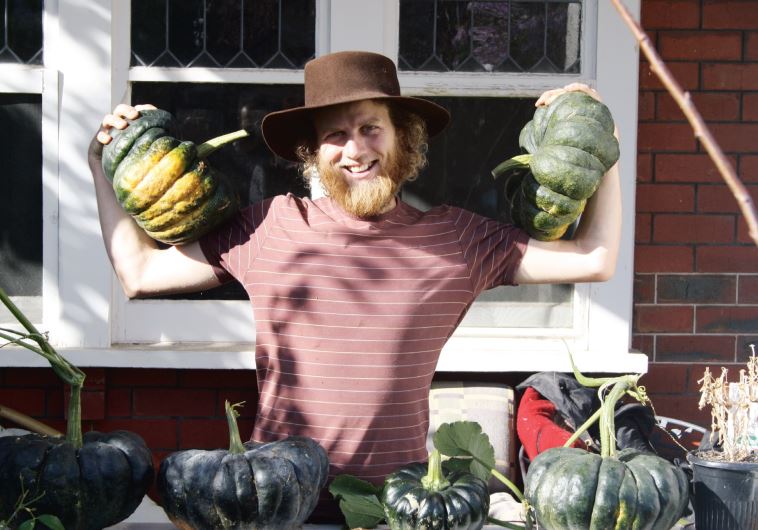 Showing off gourds at Shefa food forest