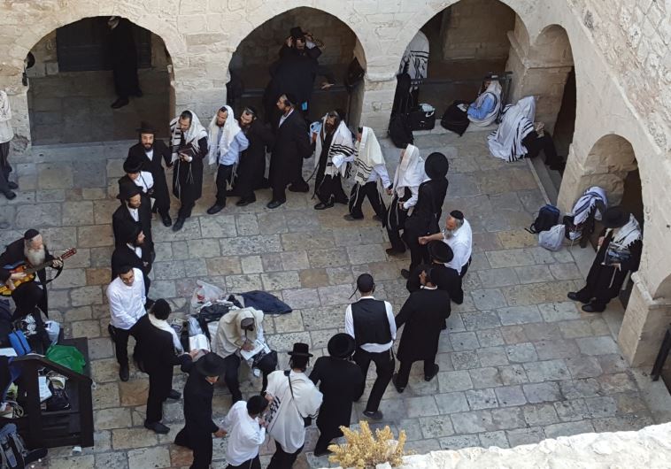 Singing, dancing and playing guitar at the courtyard on Mount Zion