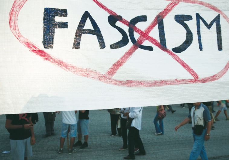 NOT APPLICABLE to Israel. Protesters take part in an anti-fascist rally in Athens in 2013.
