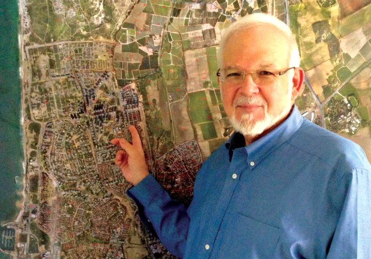 Alan Marcus with a city map: Building resilience