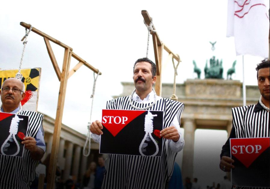 People stage a protest against the execution by Iran of up to 20 Kurds