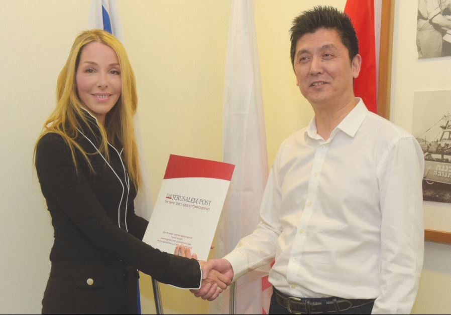 JERUSALEM POST Group CEO Ronit Hassin-Hochman meets with Bright Dairy CEO Chonjian Zhang.