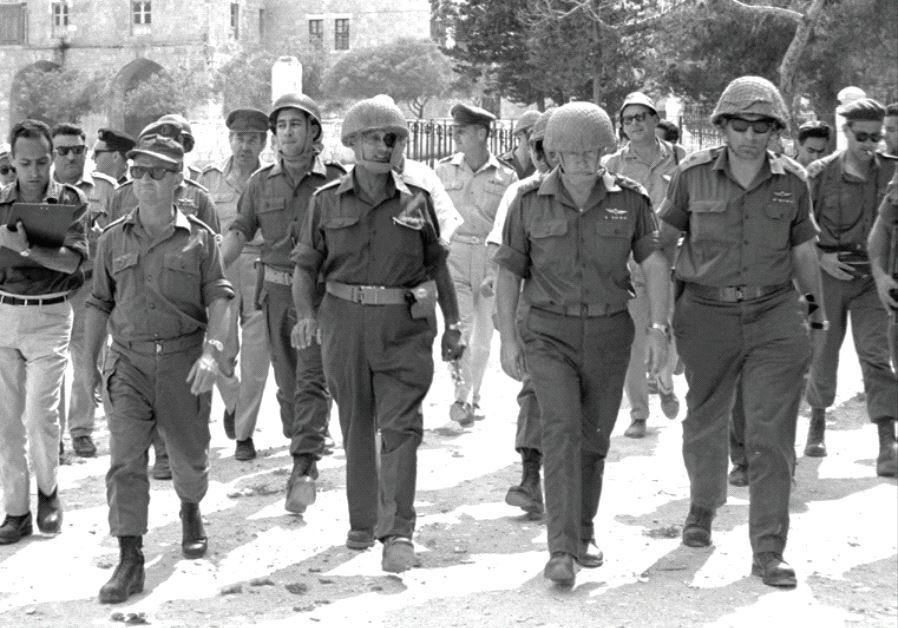 Defense minister Moshe Dayan and chief of staff Yitzhak Rabin (second right) in the Old City of Jerusalem, June 7, 1967