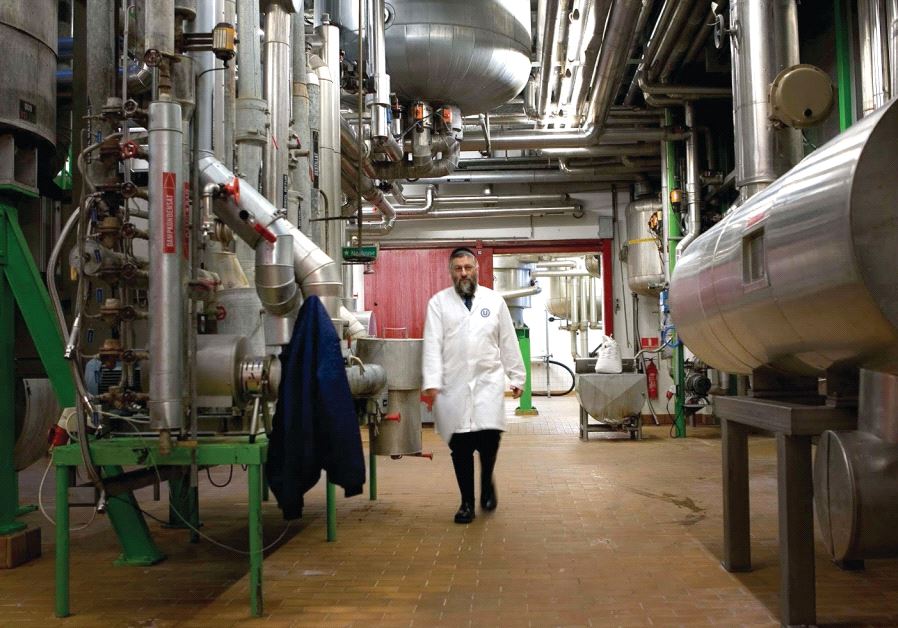 OU kashrut supervisor at work in a food manufacturing company