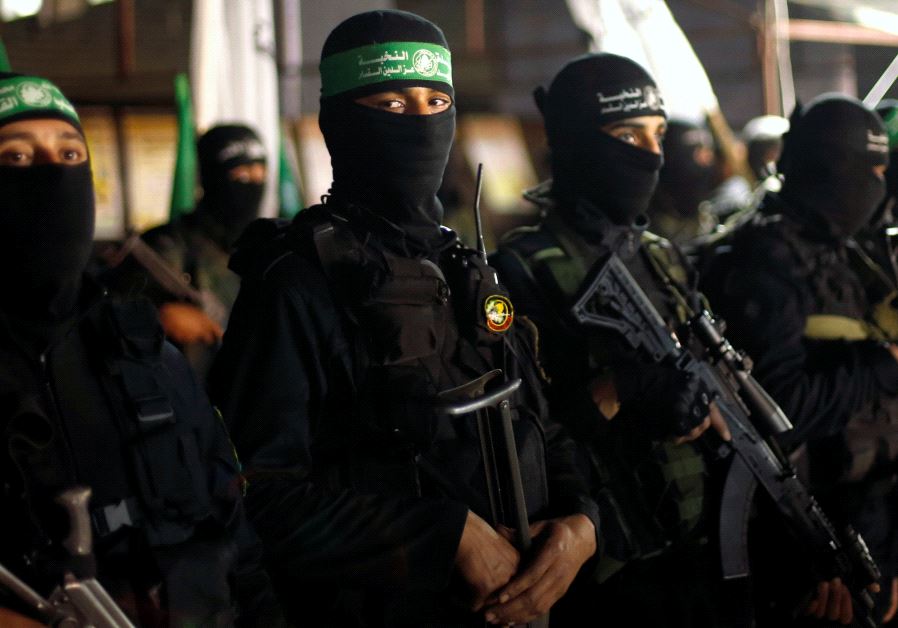 Palestinian Hamas militants take part in a memorial service for senior militant Mazen Fuqaha, in Gaza City March 27, 2017.