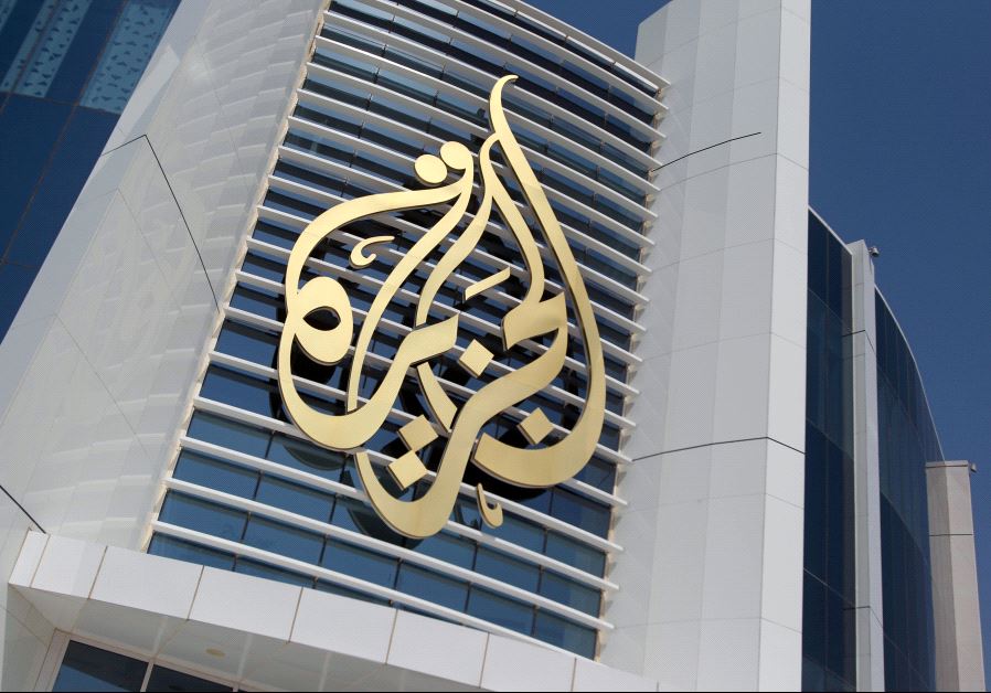 The logo of Al Jazeera Media Network is seen on its headquarters building in Doha, Qatar June 8, 2017.