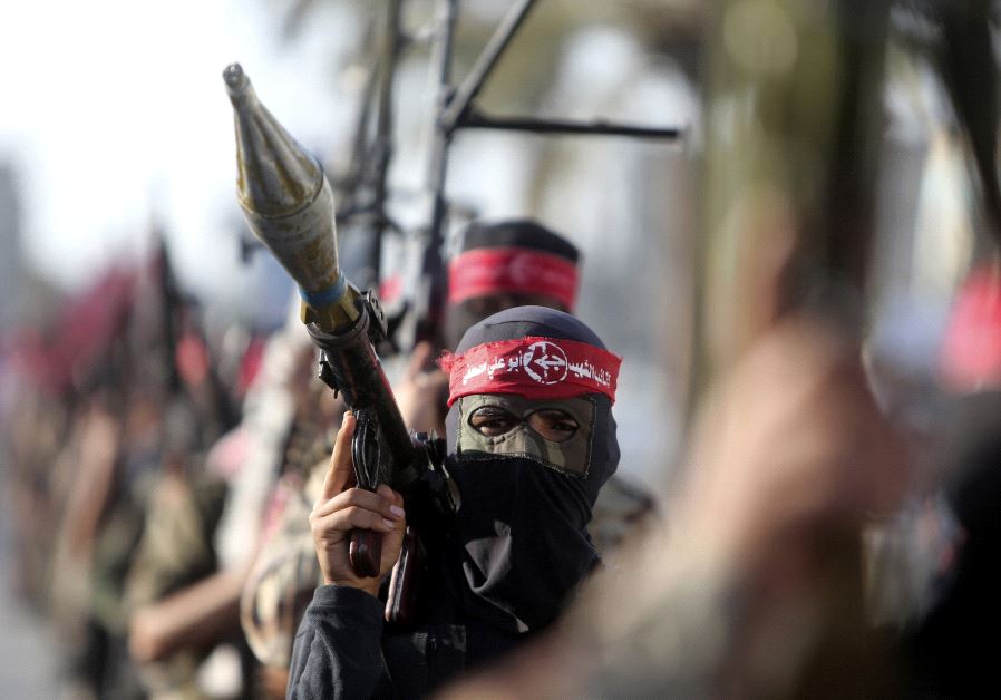 Palestinian members of the Popular Front for the Liberation of Palestine (PFLP) take part in a military show in Gaza 